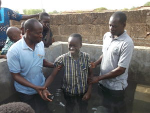 Bissa Barka church member Josias being baptised